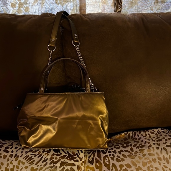 Selling a Zara Trafaluc mini purse. It has a metallic look to it. Very cute. - Picture 1 of 4